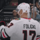 Nick Foligno #17 celebrates with his Chicago Blackhawks teammates.